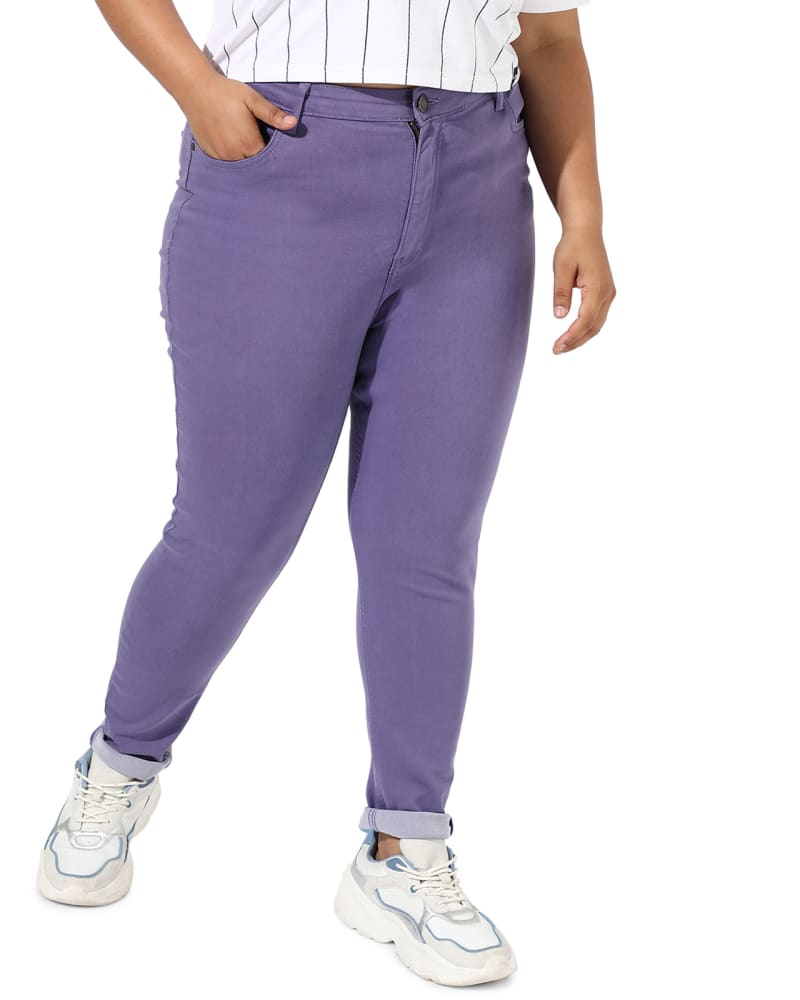 Front of a model wearing a size 36 Lilac Skinny Jeans in Purple by Instafab Plus. | dia_product_style_image_id:298194